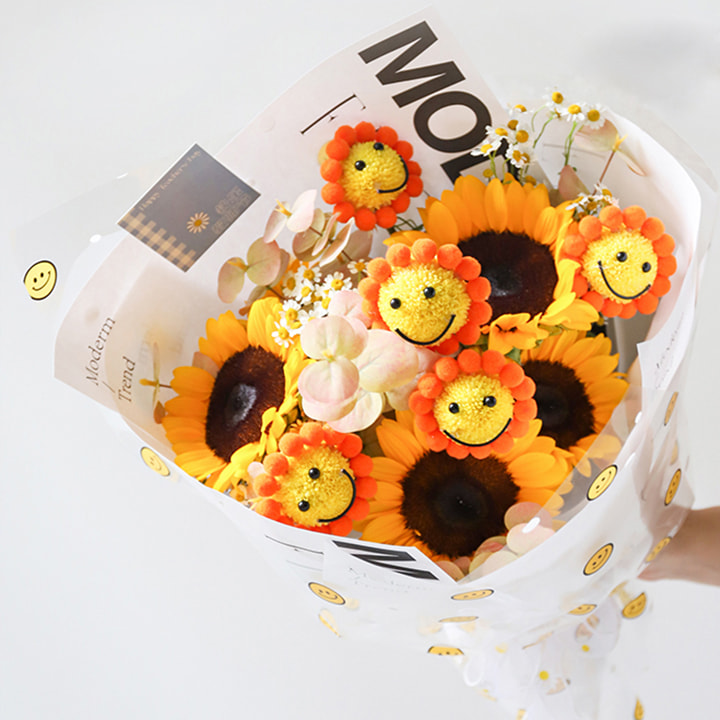 Carta da regalo con fiori con volto sorridente in cellophane OPP