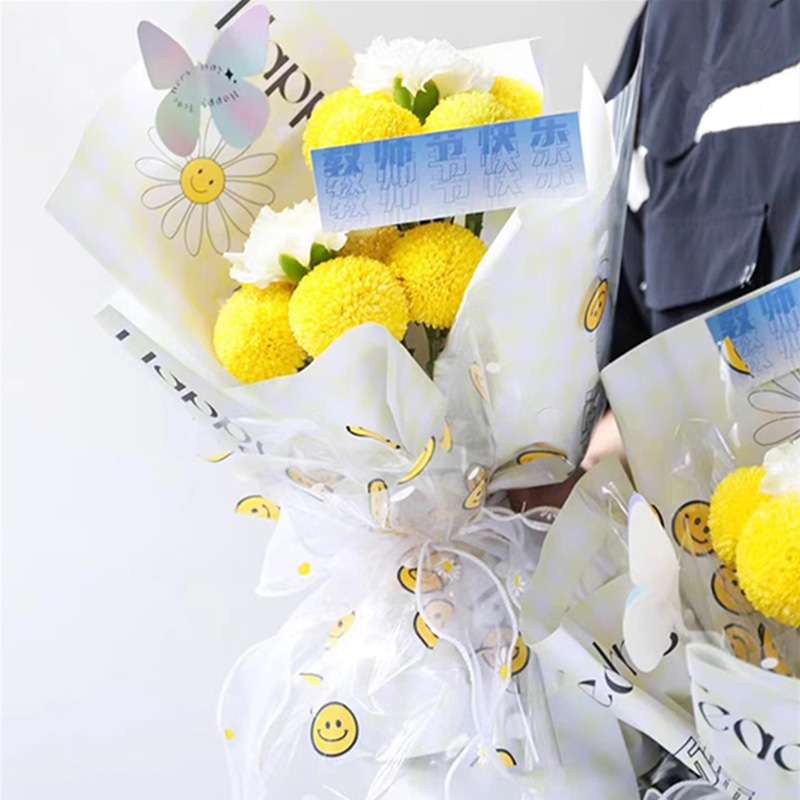 Carta da regalo con fiori con volto sorridente in cellophane OPP