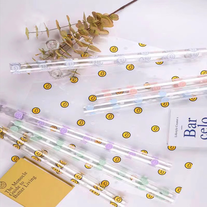Carta da regalo con fiori con volto sorridente in cellophane OPP