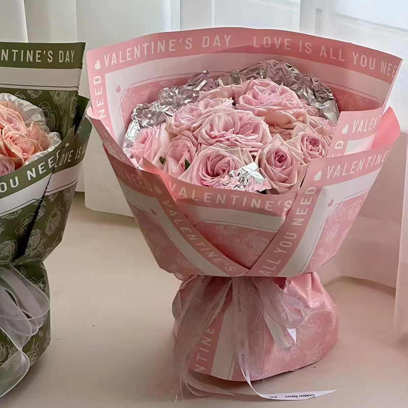 Carta da regalo con fiori con motivo rosa