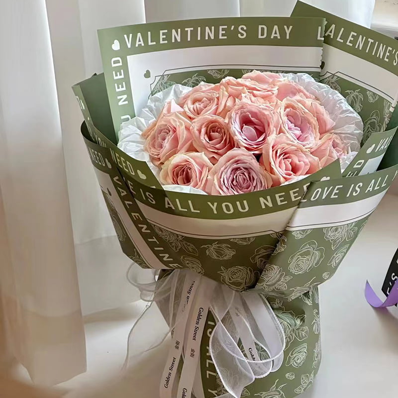 Carta da regalo con fiori con motivo rosa